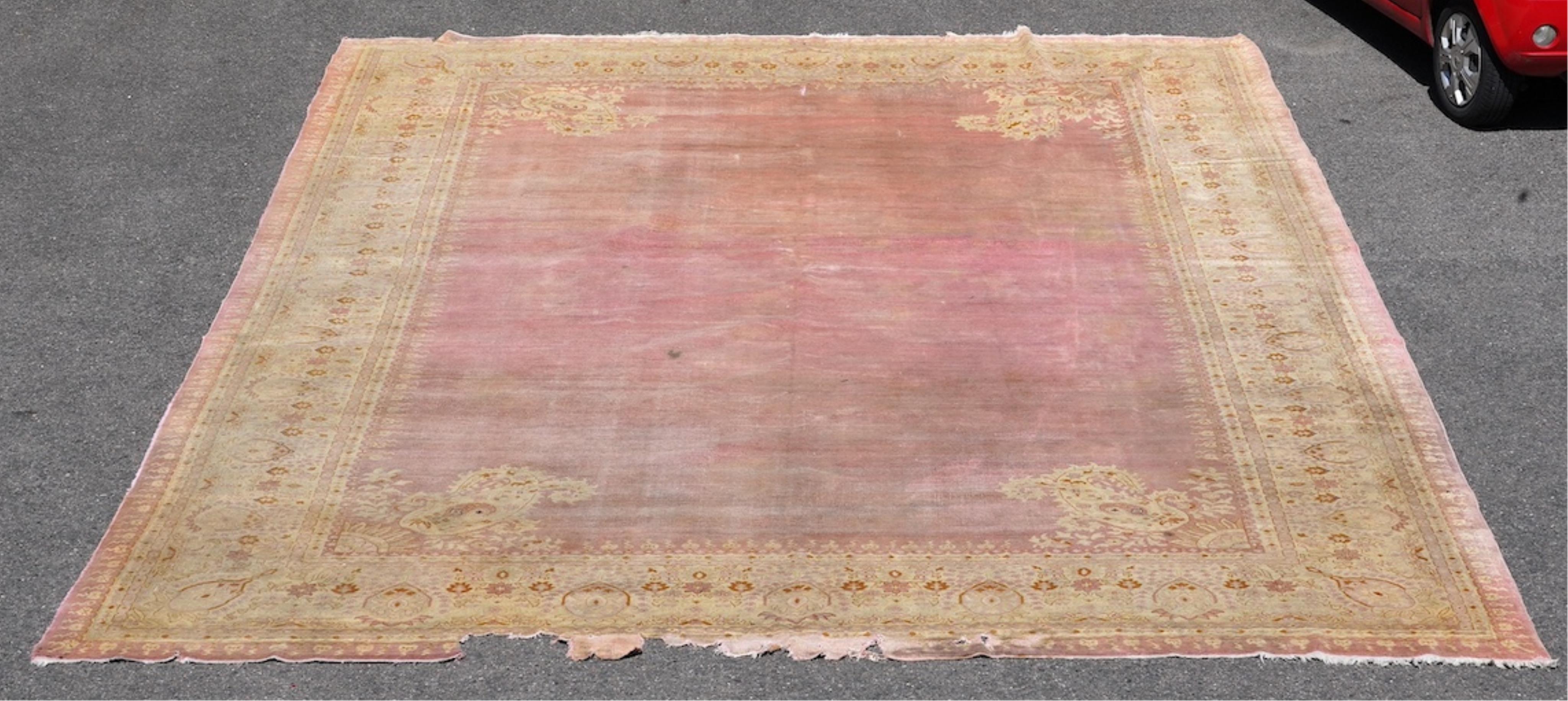 An Amritsar carpet, approximately 580 x 395cm. Condition - poor